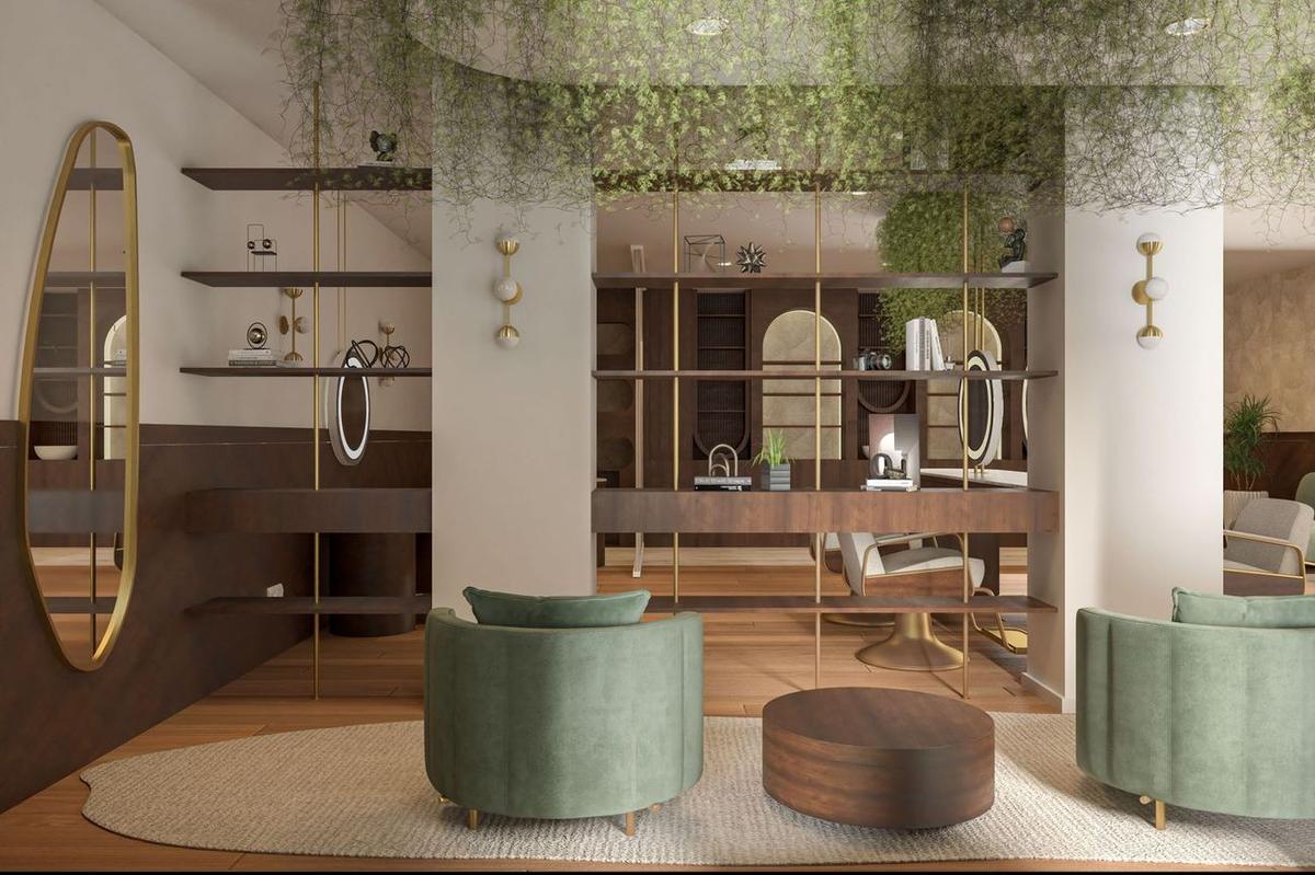 El lobby con sillones de terciopelo verde y plantas colgantes